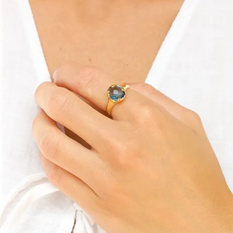 donkerblauw kristal ring in verguld messing