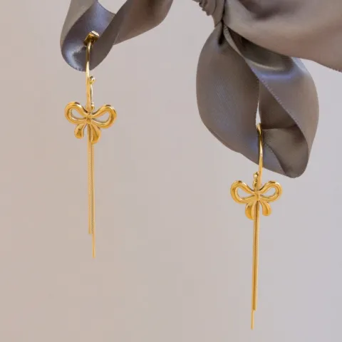 waterproof strikje oorbellen in verguld staal - OCEANA