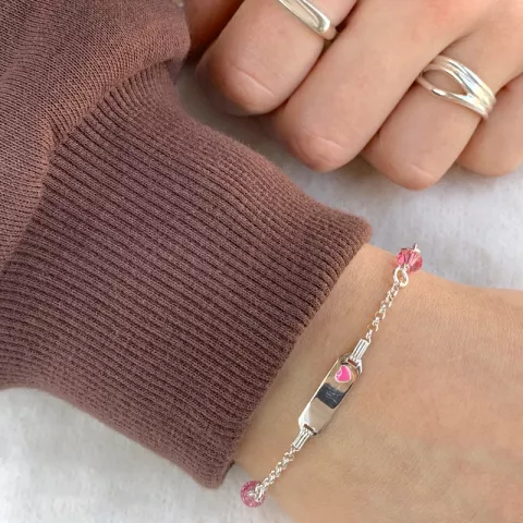 roze kinder armband in zilver met hanger in zilver