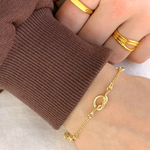 knoop armband in verguld sterlingzilver met hanger in verguld sterlingzilver