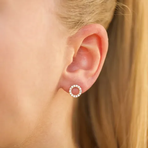 rond witte oorsteker in verguld zilver