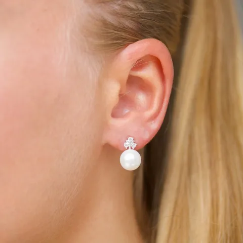 bloem parel oorbellen in zilver