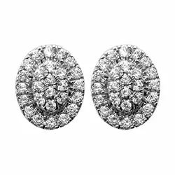 ovaal diamant oorsteker in 14 karaat witgoud met diamant