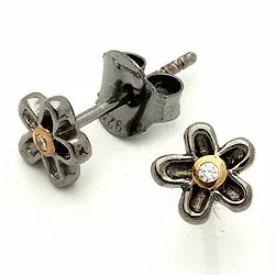 klein bloem oorsteker in zwart gerhodineerd zilver met verguld sterlingzilver