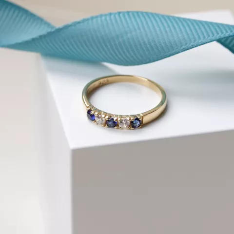 elegant smal blauwe zirkoon mémoire ring in verguld sterlingzilver