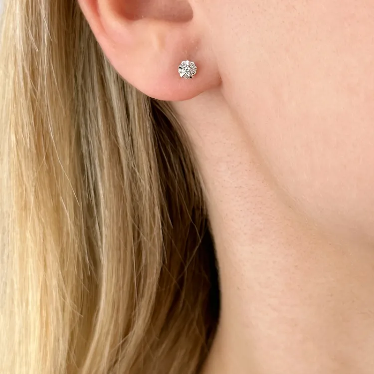 rond diamant oorsteker in 14 karaat witgoud met diamant en diamant 