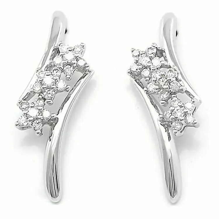 Bloem diamant oorbellen in 14 karaat witgoud met diamanten