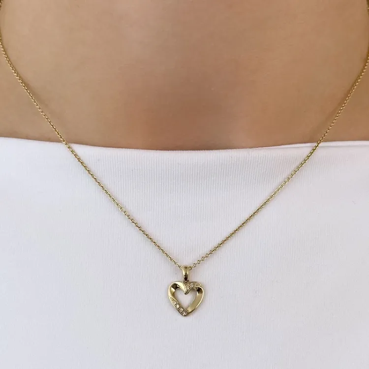 hart diamant hanger in 14 caraat goud 0,03 ct