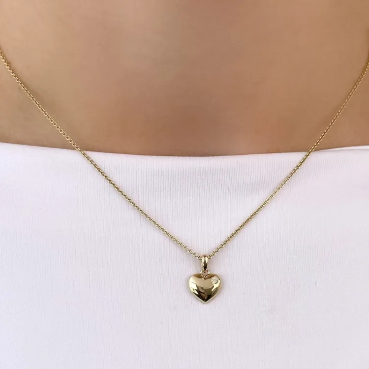 hart diamant hanger in 14 caraat goud 0,015 ct