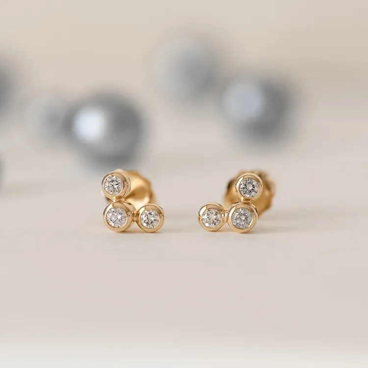 rond diamant oorsteker in 14 karaat goud met diamant