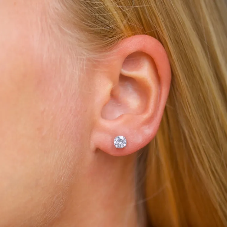 5 mm rond oorbellen in 14 karaat witgoud met zirkoon