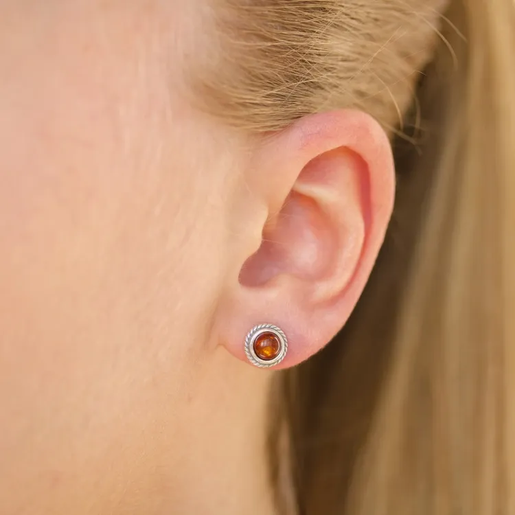 rond barnsteen oorbellen in geoxideerd sterlingzilver