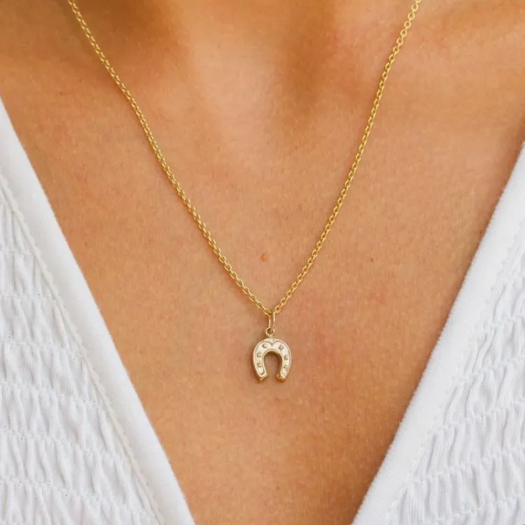 hoefijzer ketting in verguld sterlingzilver met hanger in 8 karaat goud - Gold Collection