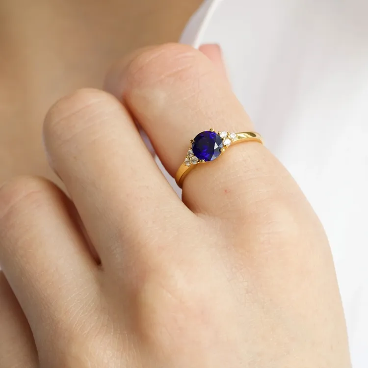 blauwe syntetische saffier ring in 9 karaat goud - Gold Collection