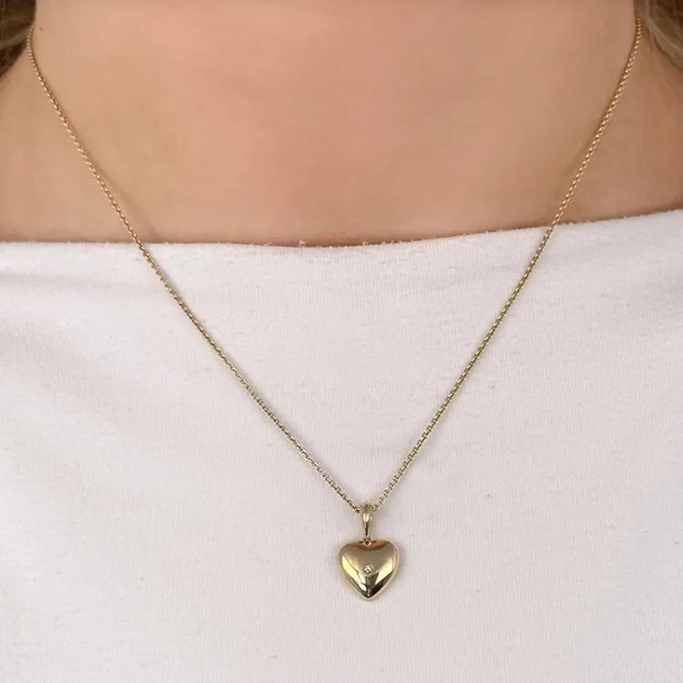 hart diamant hanger in 14 caraat goud 0,01 ct