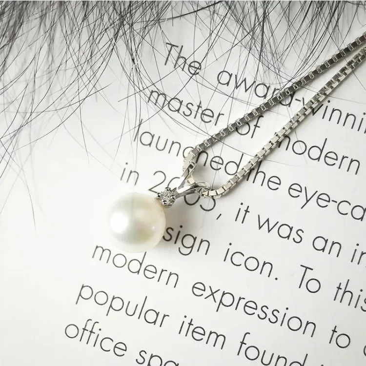 parel hanger in 14 caraat witgoud 0,02 ct