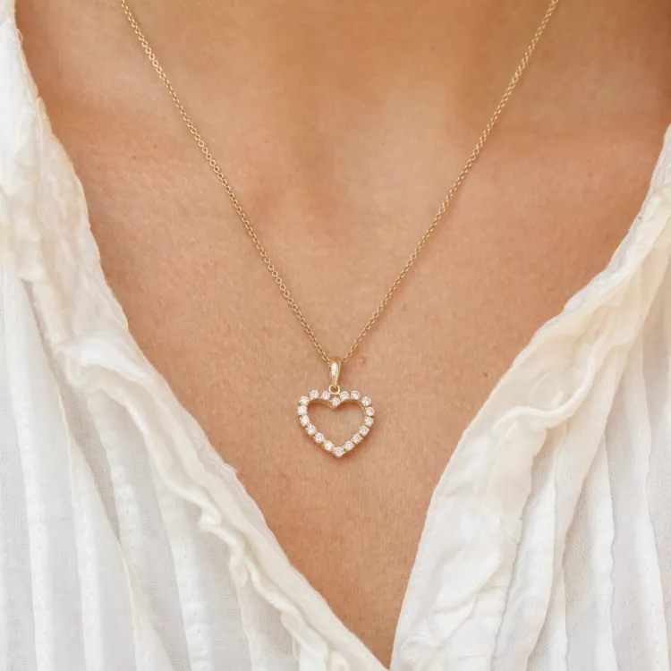 hart hanger in 14 caraat goud 0,39 ct