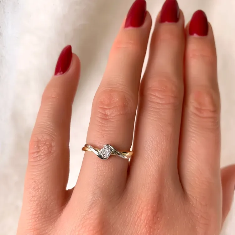 diamant ring in 14 karaat goud-en witgoud 0,06 ct