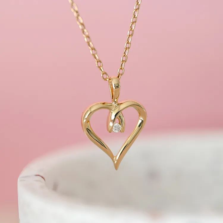 hart diamant hanger in 14 caraat goud 0,04 ct