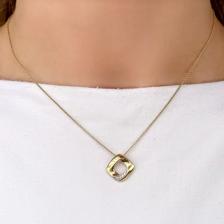 diamanten hanger in 14 caraat goud-en witgoud 0,05 ct