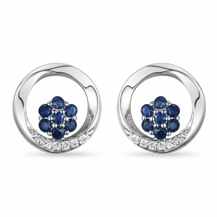 rond saffier oorsteker in 14 karaat witgoud met diamant en saffier