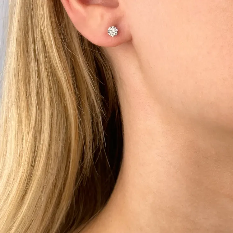 rond diamant oorsteker in 14 karaat witgoud met diamant