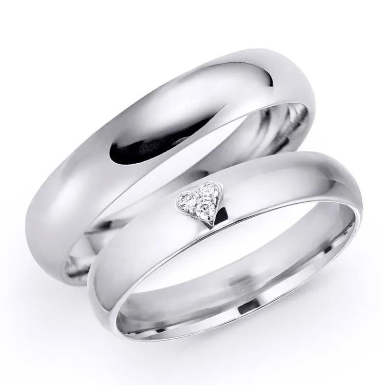 4 mm trouwringen in 14 karaat witgoud 0,03 ct - set