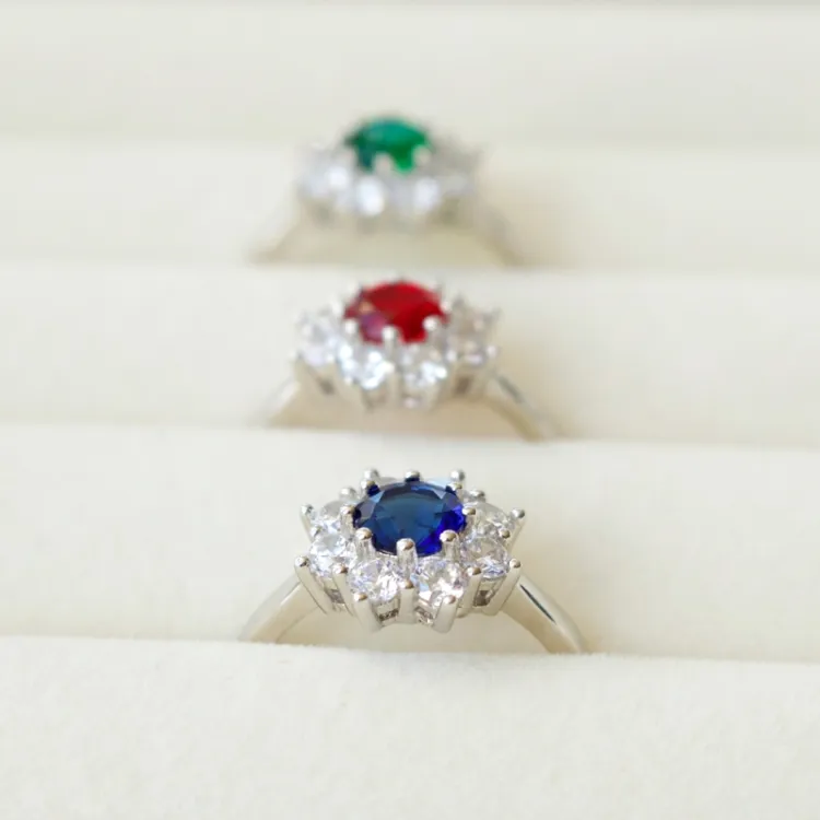 blauwe syntetische saffier rozetring in zilver