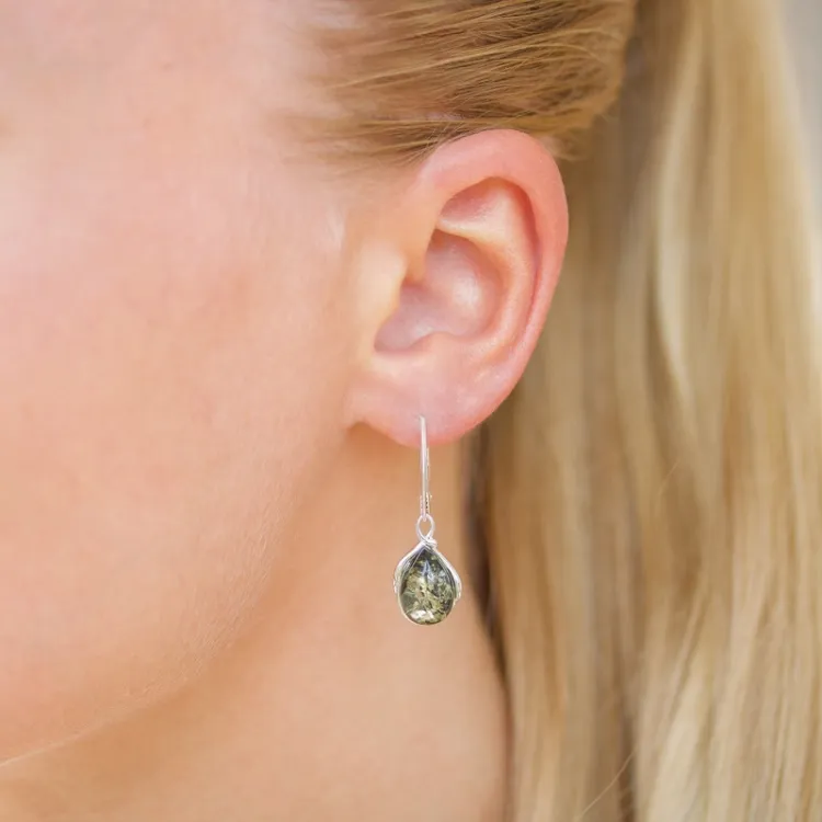lange groen barnsteen oorbellen in zilver