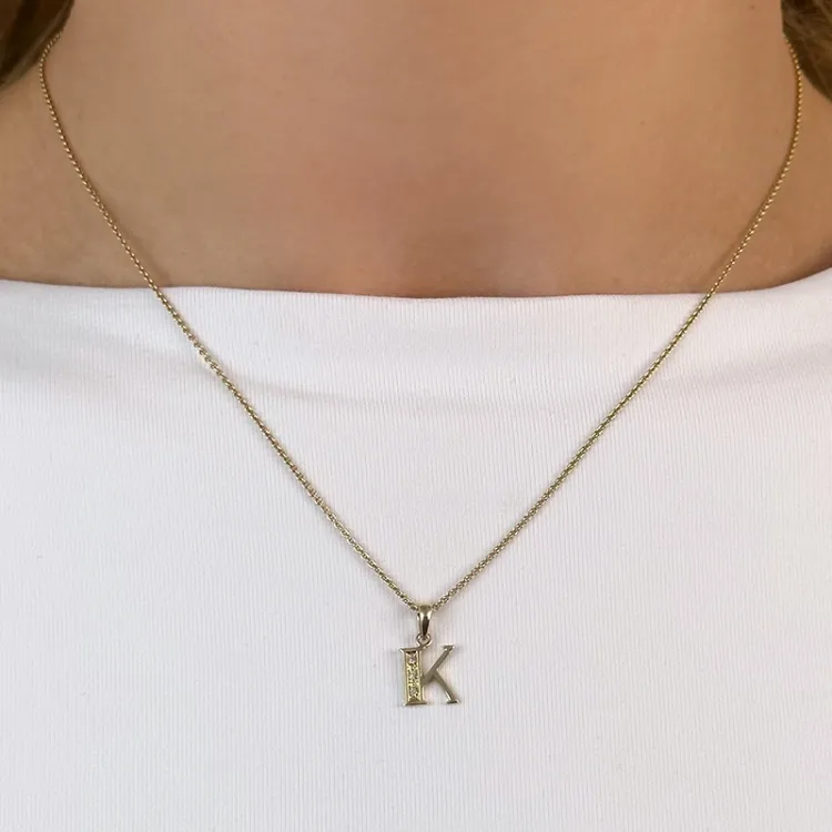 letter k diamanten hanger in 9 caraat goud 0,02 ct