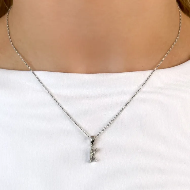 Letter k diamant hanger in 9 caraat witgoud 0,06 ct