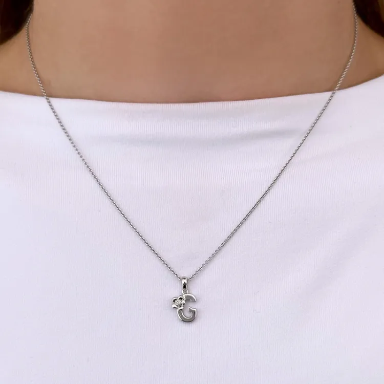 letter g diamanten hanger in 9 caraat witgoud 0,01 ct
