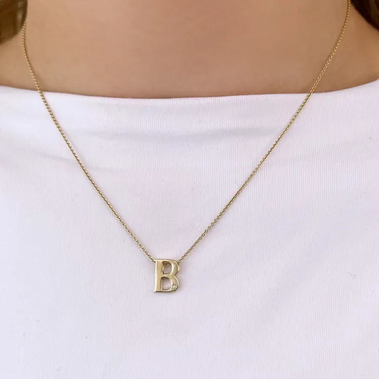 Letter b diamant hanger in 9 caraat goud 0,01 ct