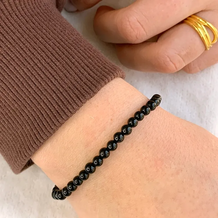 eenvoudige zwart onyx armband in leren snoer - Loom Stones