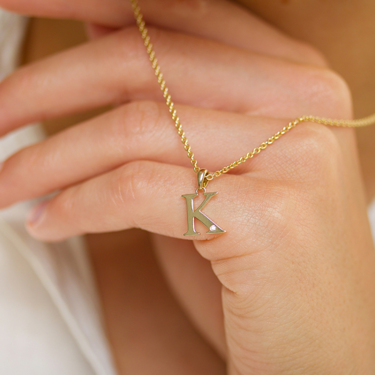 letter k diamant hanger in 9 caraat goud 0,01 ct