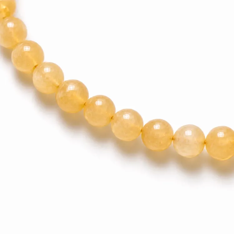 gele jadesteen armband in verguld staal - AURA