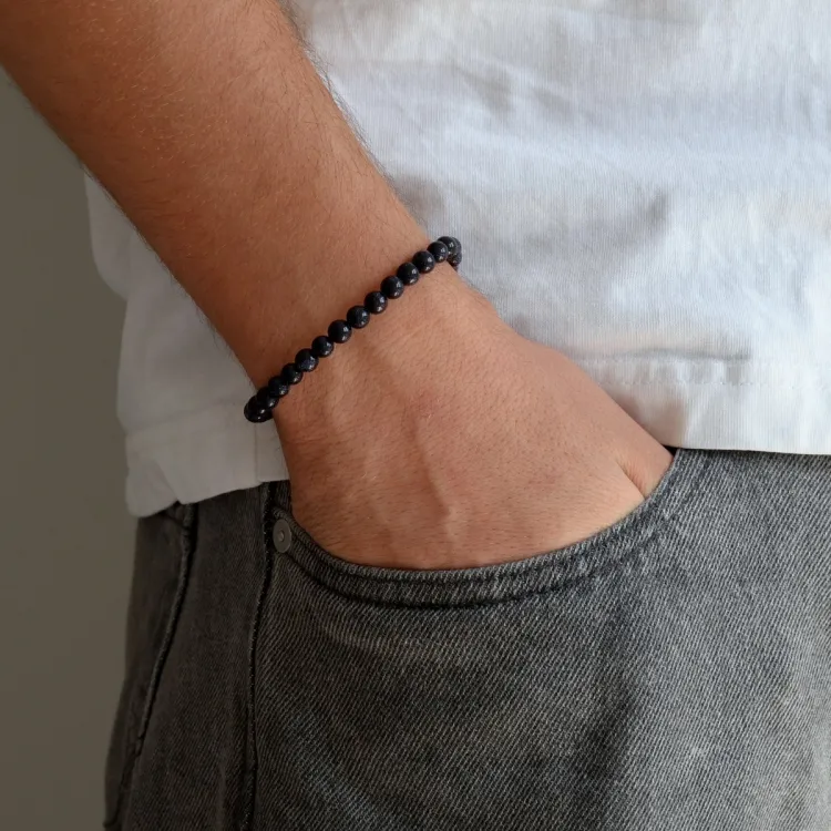 blauwe goldstone armband in nylon met verstelbaar koord