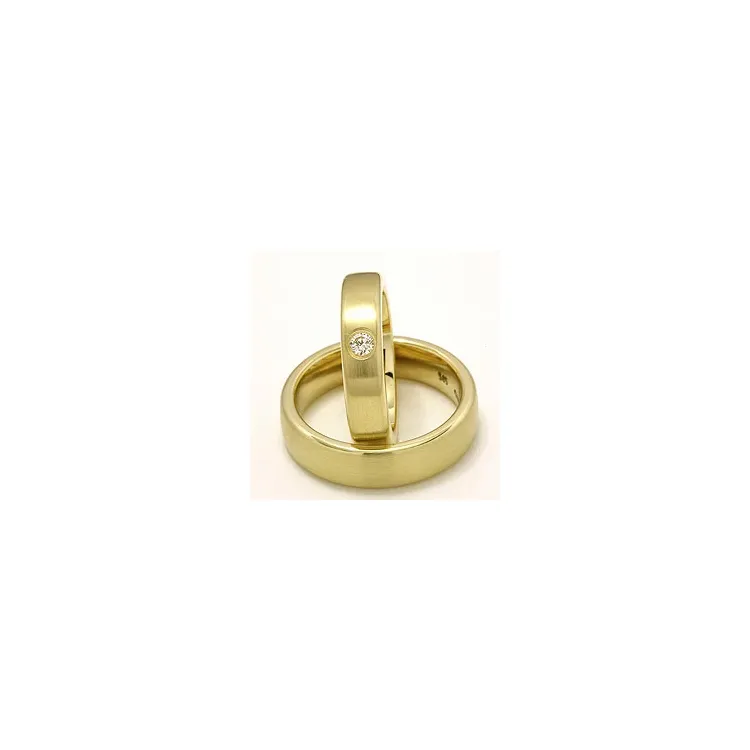 Matte trouwringen in 14 karaat goud 0,11 ct - set