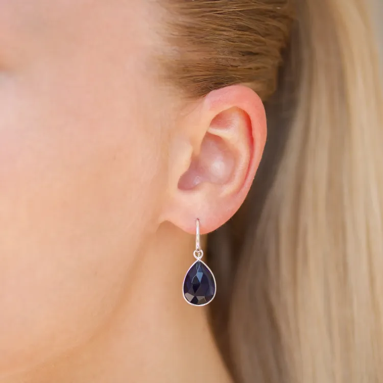 synthetisch blauwe saffier oorbellen in zilver