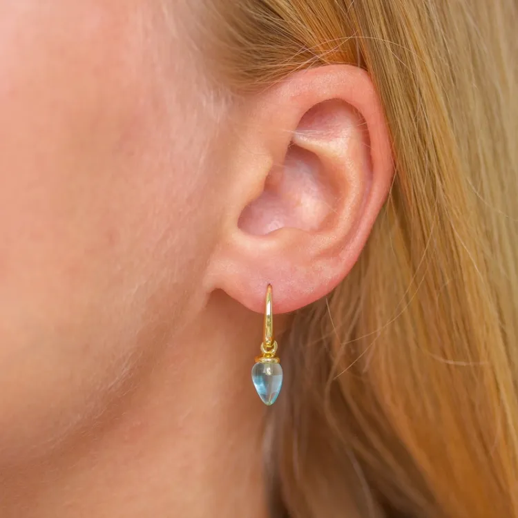 blauwe kristal oorbellen in verguld zilver - Loom Stones