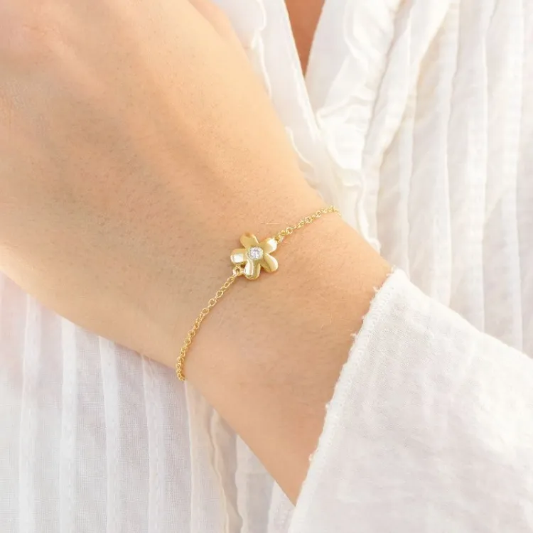 bloem zirkoon armband in verguld messing - Eliné