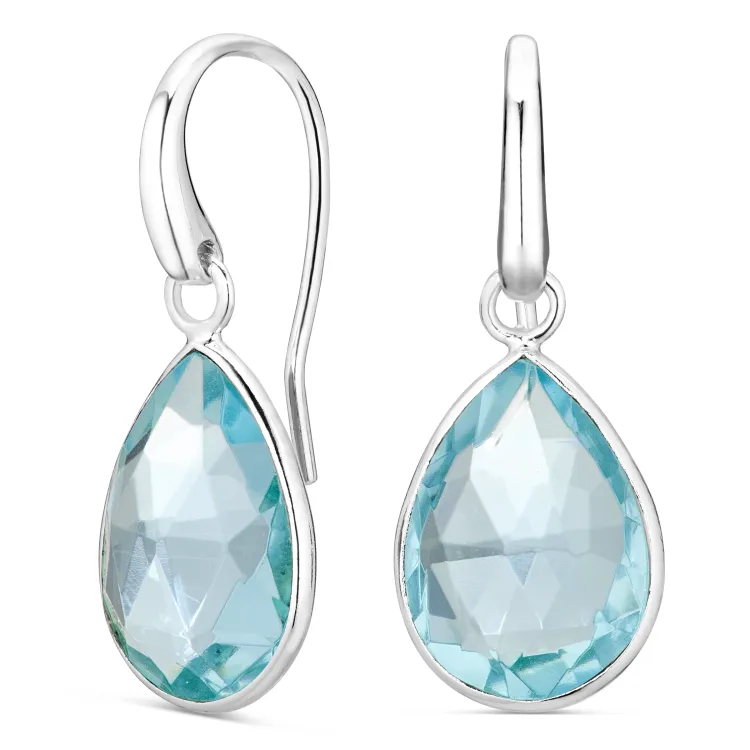 blauwe kristal oorbellen in verzilverd messing - Loom Stones