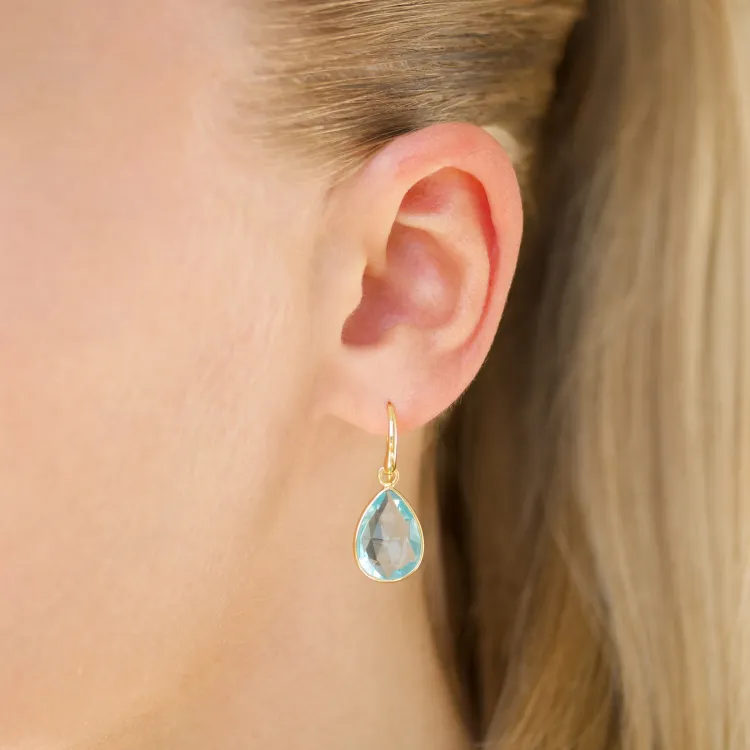 blauwe kristal oorbellen in verguld messing - Loom Stones