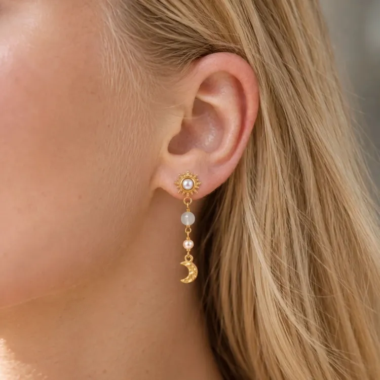 zon aqua kristal ketting oorbellen in verguld messing - Eliné