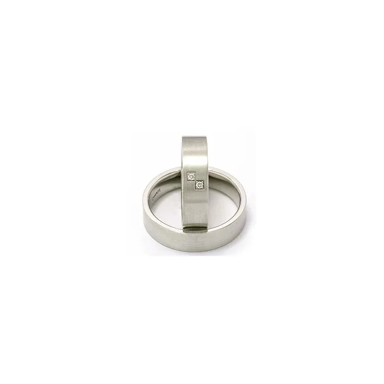 Trouwringen in 14 karaat witgoud 2 x 0,015 ct - set