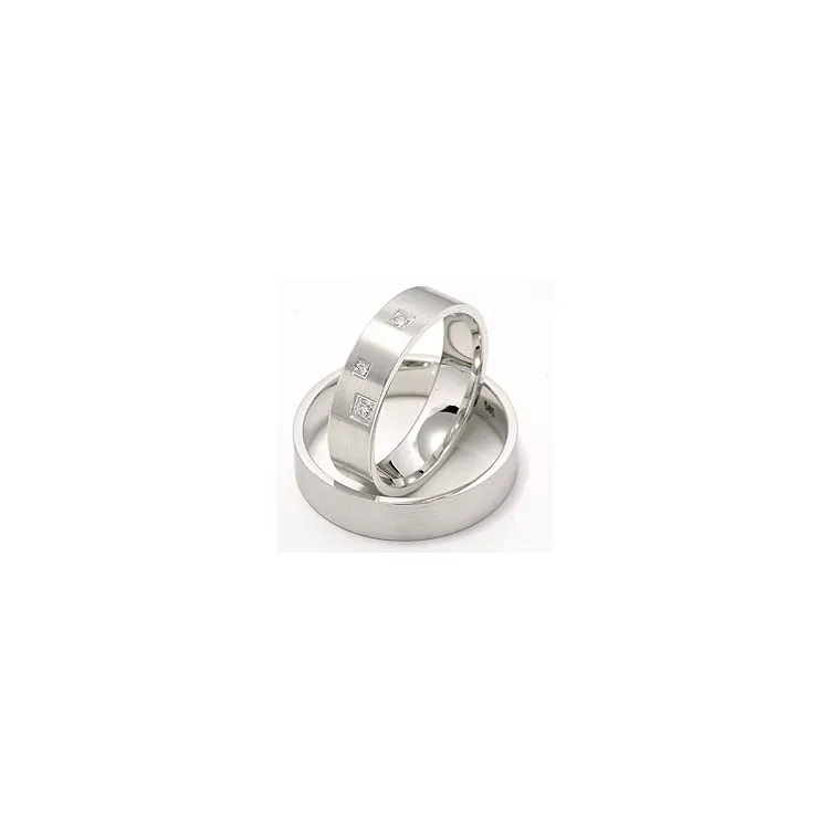 Matte sterrenstof trouwringen in 14 karaat witgoud 0,047 ct - set