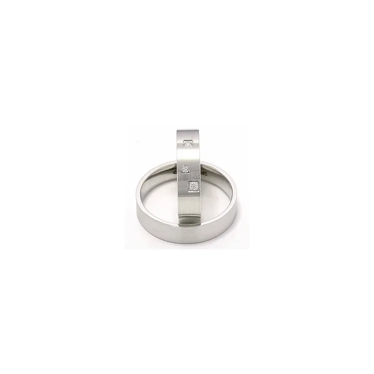 Matte sterrenstof trouwringen in 14 karaat witgoud 0,047 ct - set