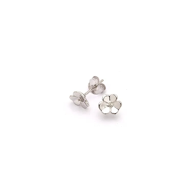 bloem oorsteker in zilver met diamant 