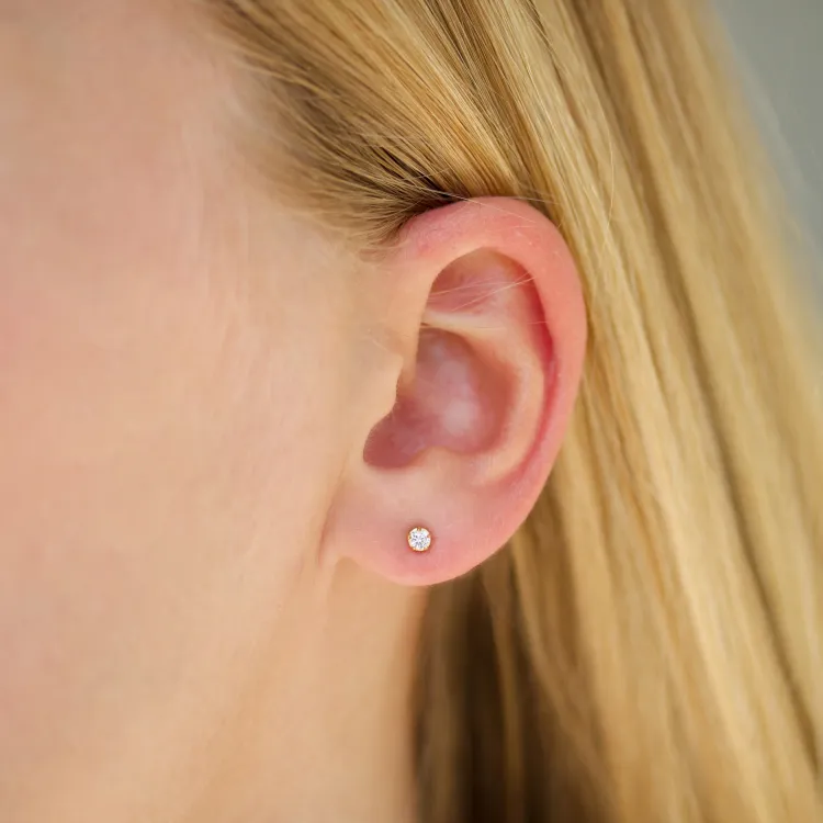 3 mm zirkoon solitaire oorbel in verguld zilver