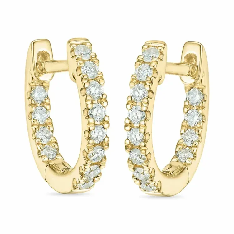 verzamelmonster diamant creool in 14 karaat goud met diamant